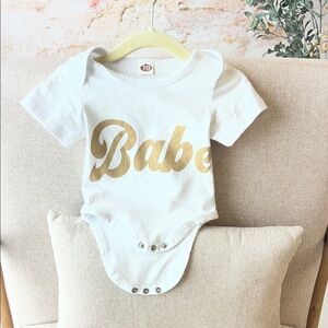 Amazon White and Gold Babe Bodysuit